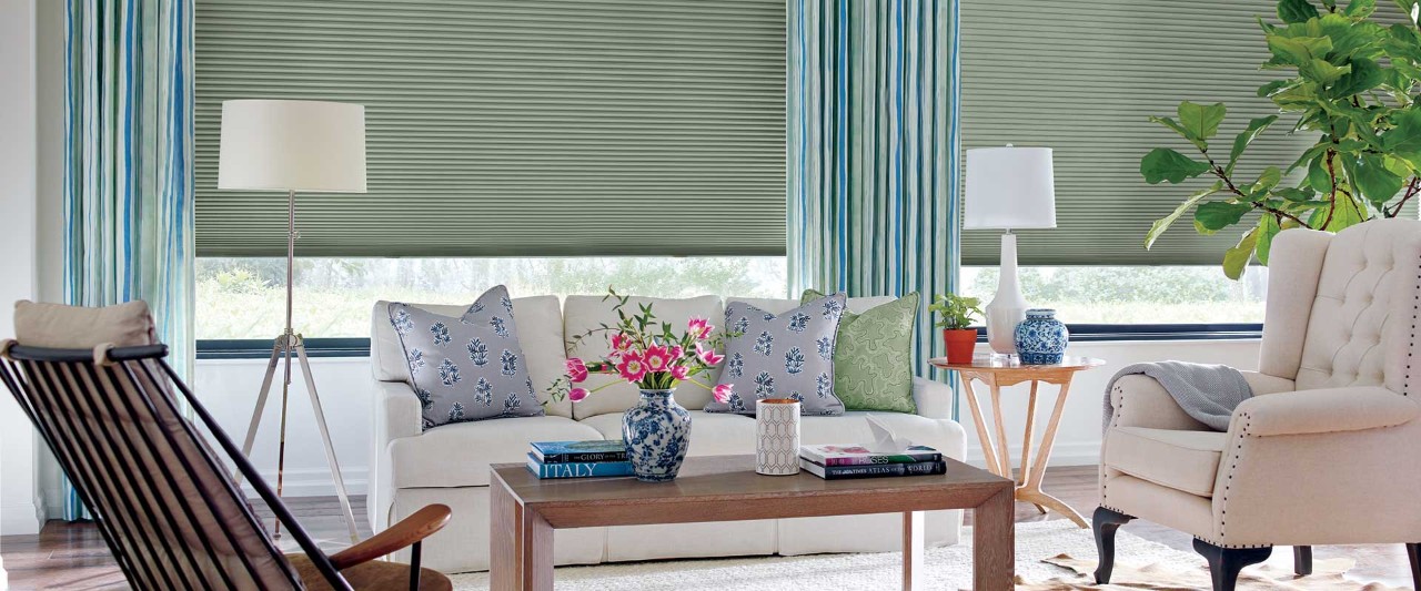 Living room with blue and green Design Studio drapery.